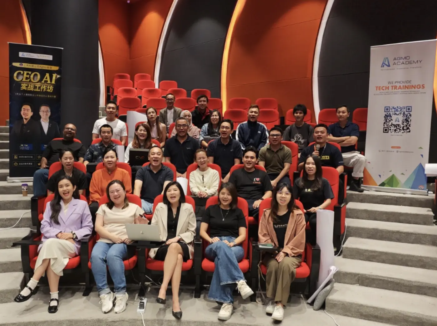 AI Forward CXO Program cohort at the CEO AI practical workshop, with Agmo Academy banner