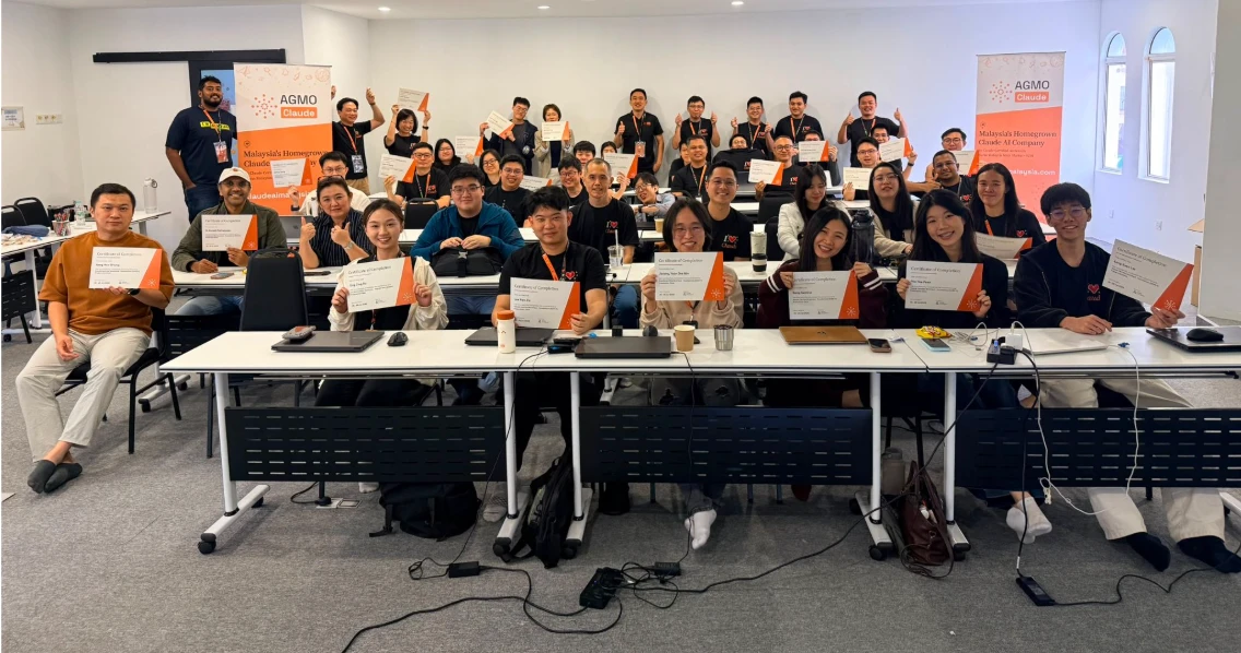 A full CCAR-F cohort holding their certificates of completion, with AGMO Claude branding visible