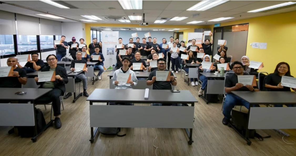 Another CCAR-F cohort holding their certificates of completion at Agmo Academy